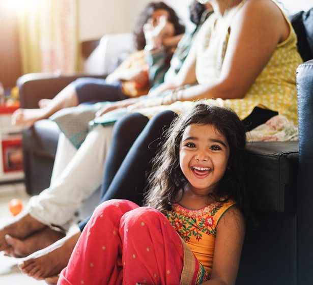 indian-family-having-fun-at-home-sitting-on-sofa-2026-01-11-08-11-33-utc